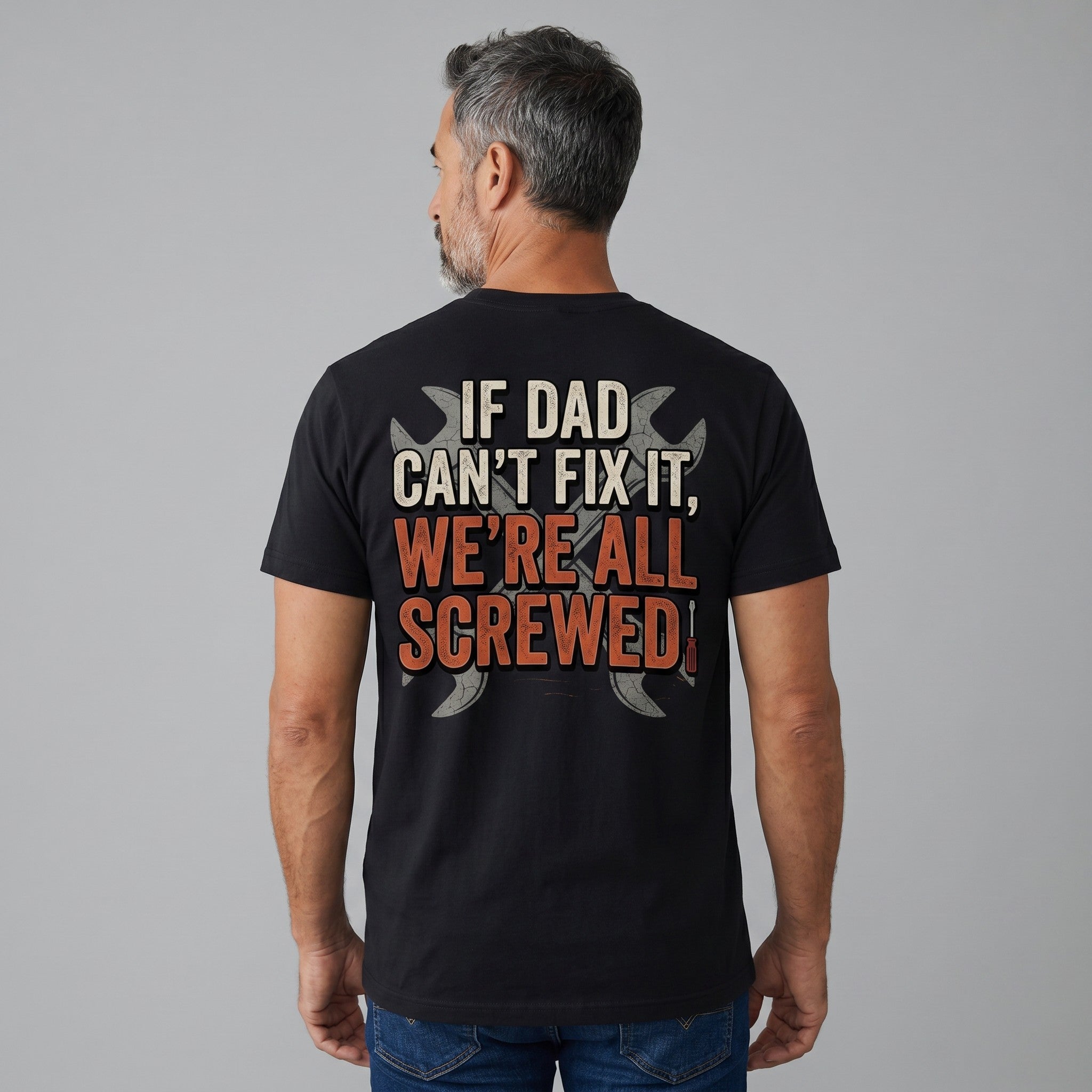TrendyShift.Com black unisex crew neck t-shirt with Dad's Repair Shop graphic on back worn by a man from behind